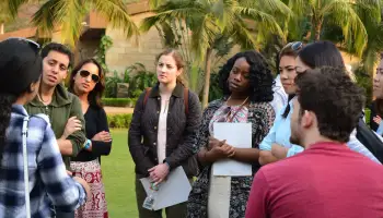 NYU Stern MBA students conducting an academic case study at Della Resorts on local community impact and development