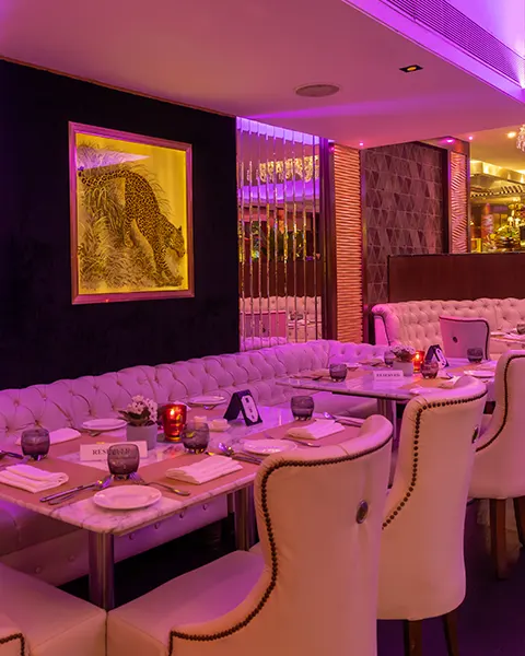 Fine dining restaurant and adjoining poolside lounge exhibiting culinary artistry