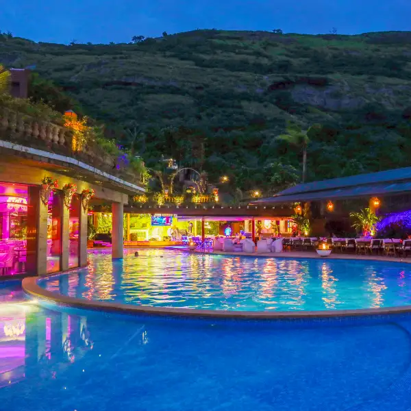 Fine dining restaurant and adjoining poolside lounge exhibiting culinary artistry