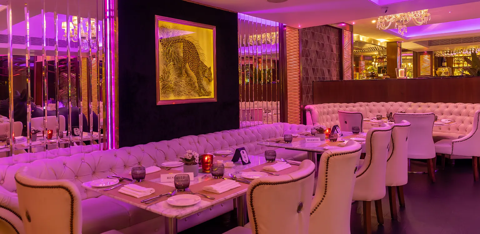 Fine dining restaurant and adjoining poolside lounge exhibiting culinary artistry