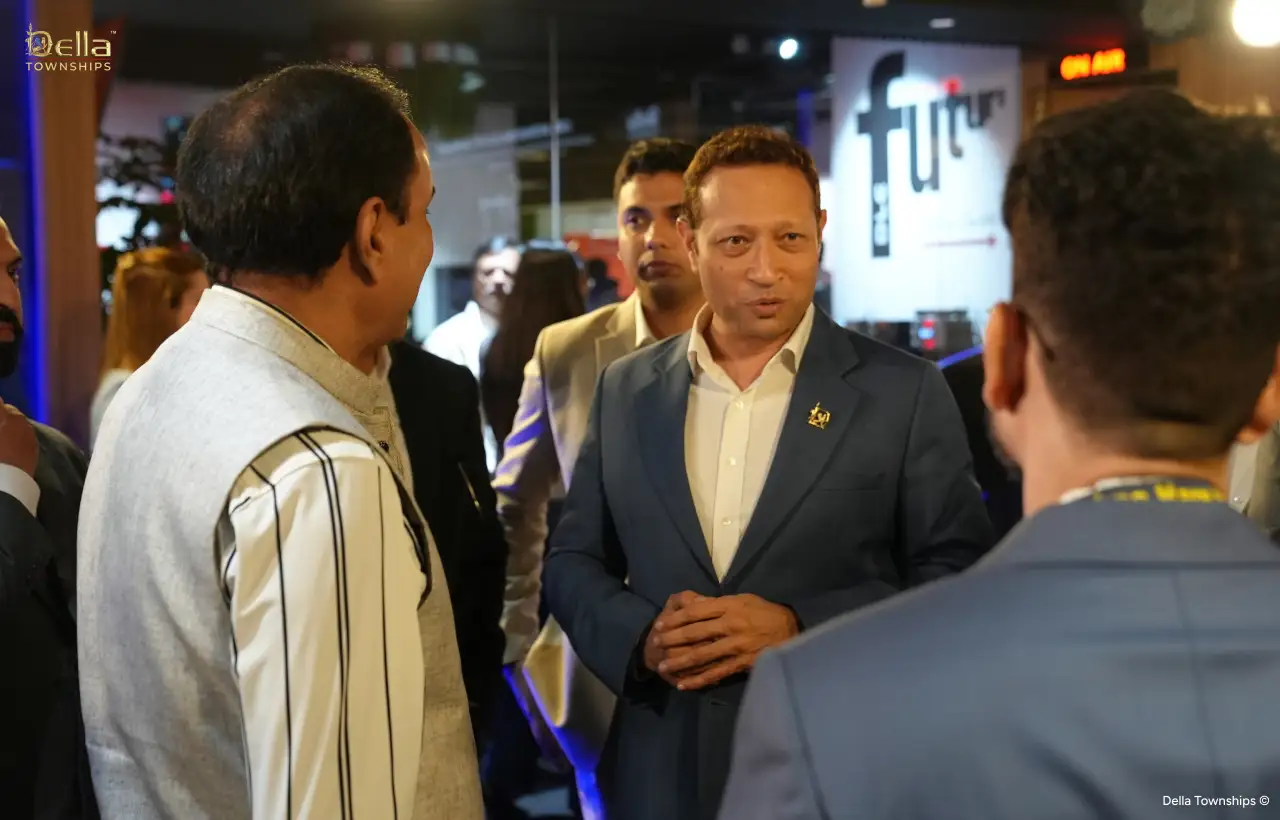 Della Townships leadership interacting with industry partners at Ahmedabad signing event