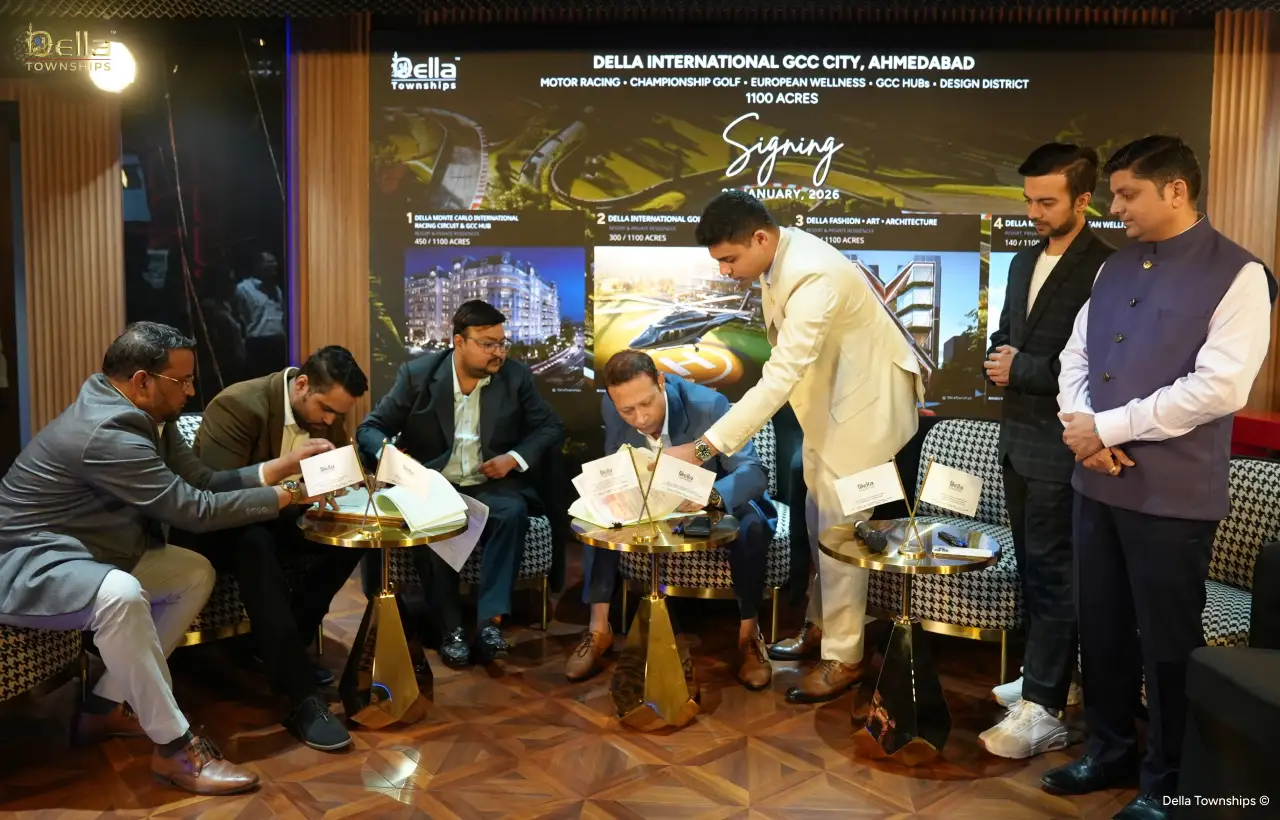 Partners signing collaboration agreement at Della Townships Ahmedabad