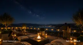 Rooftop firepit lounge with panoramic night views at Della Townships luxury villas