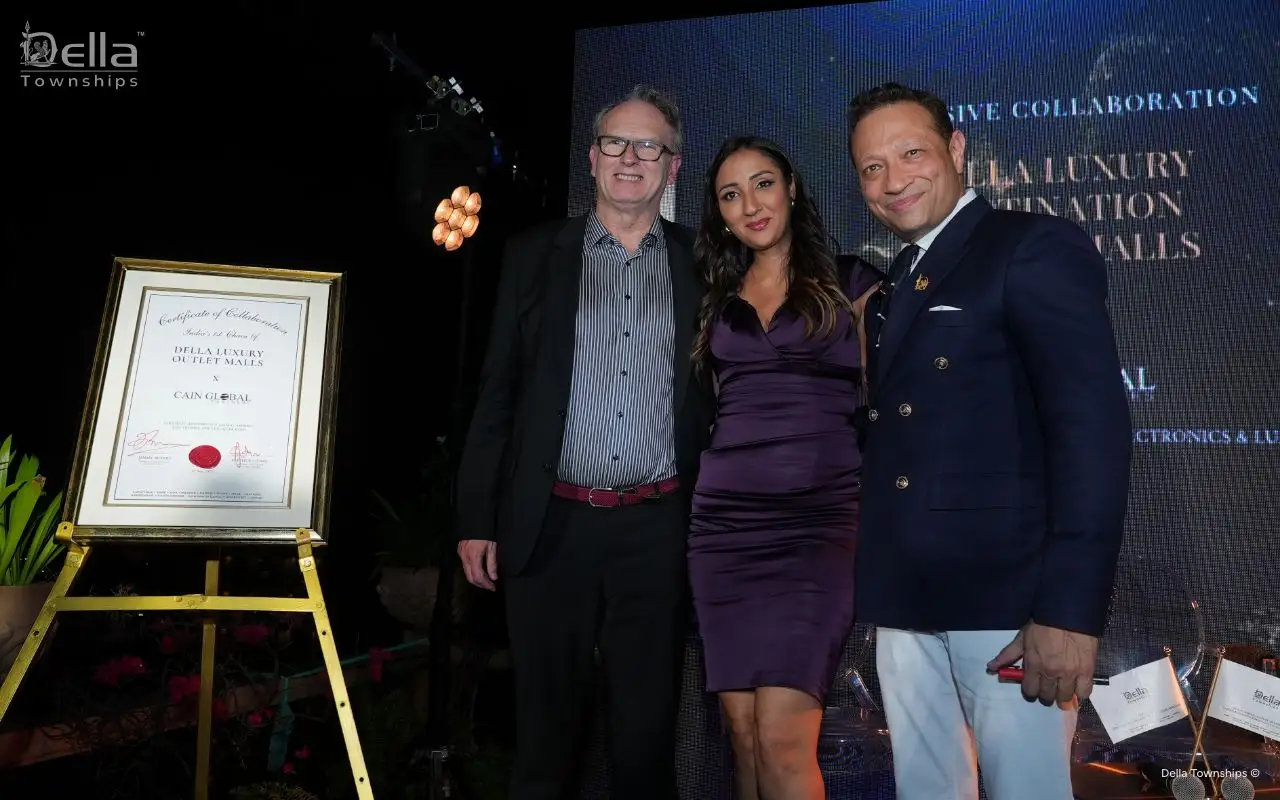 Brand collaboration certificate between Della Townships Design District and Cain Global at launch event