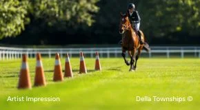 Equestrian activity at Della Racecourse with rider in ground
