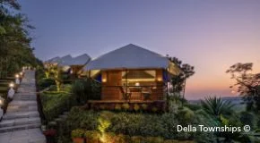 Aerial view of equestrian glamping resort at Della Townships Racecourse Pune