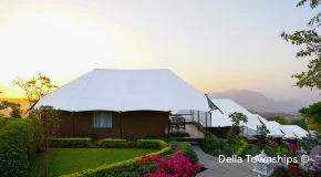 Exterior view of equestrian glamping resort at Della Townships Racecourse Pune