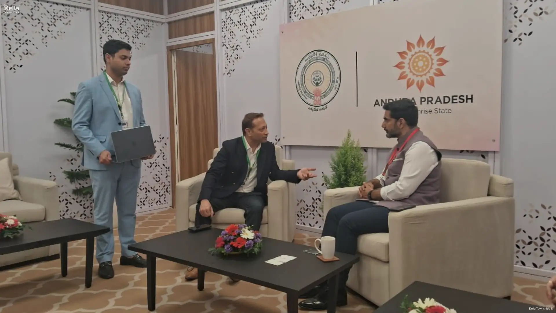 Andhra Pradesh officials reviewing Vasudhaiva Kutumbakam Tirupati scale model at summit