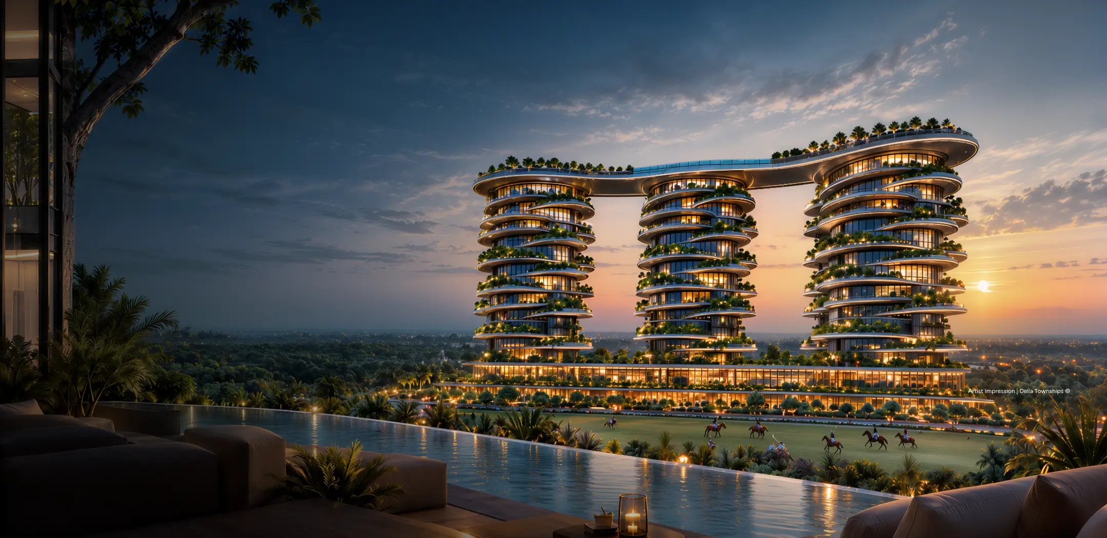 Della Townships India luxury residential towers with polo lawn and helipad at sunset