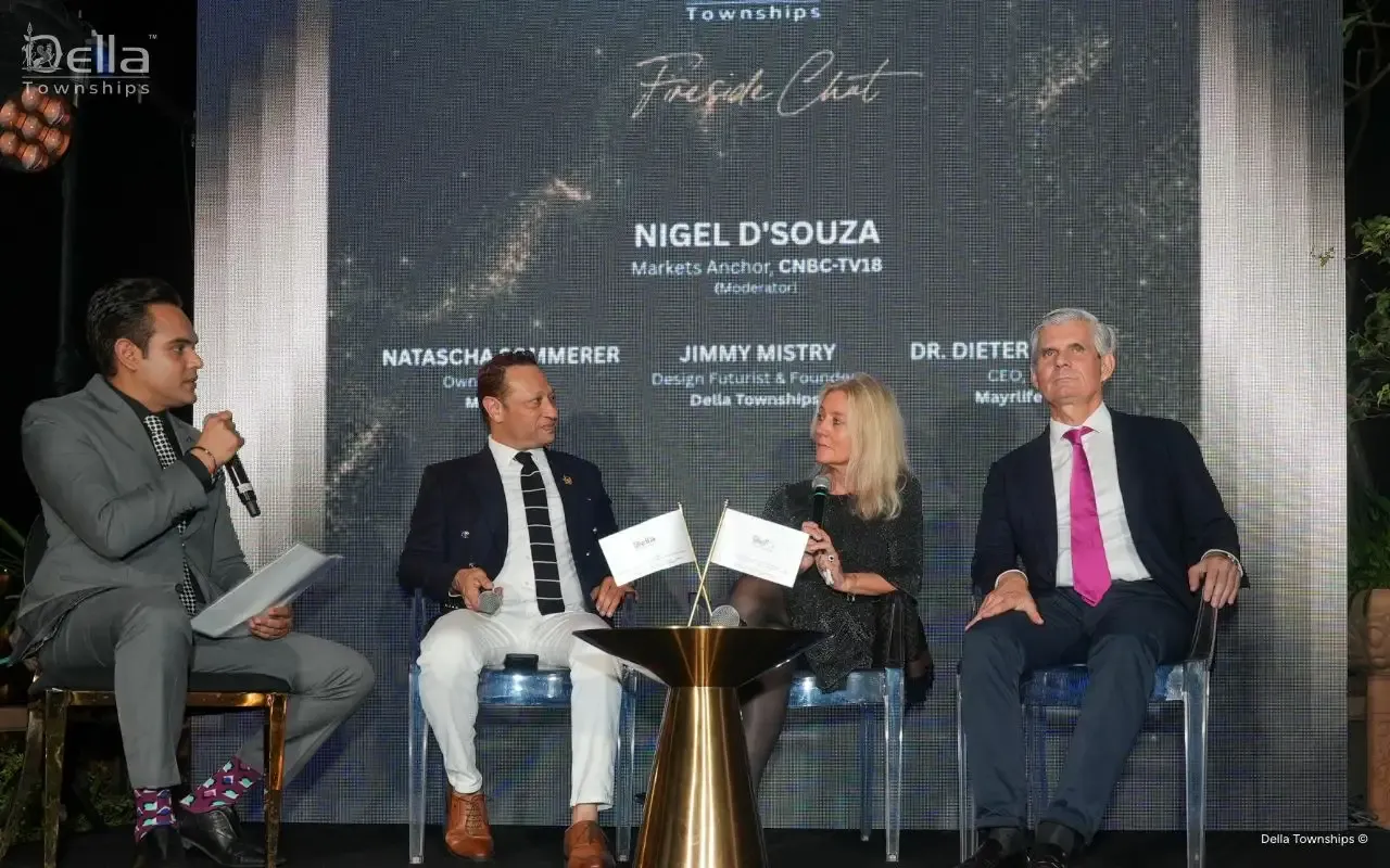 Fireside chat panel at Della Townships launch featuring global wellness leaders